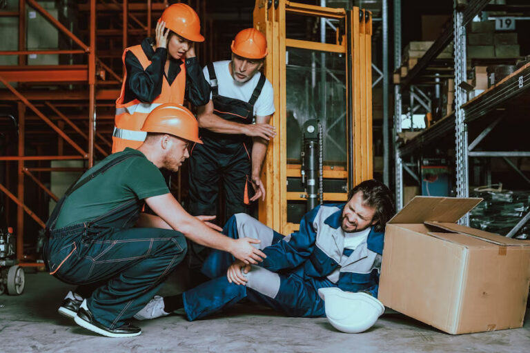 young-warehouse-worker-injured-leg-workplace_99043-677