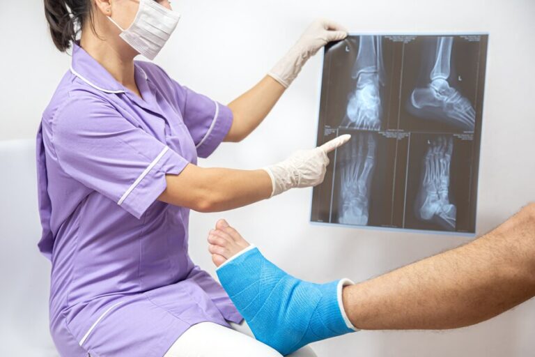 bone-fracture-foot-leg-male-patient-being-examined-by-woman-doctor-hospital_169016-7109